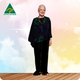 Woman in a dark outfit standing on a wooden floor with a colorful background and 'Australian Made' logo.